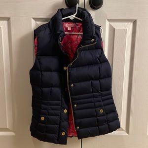 Lilly Pulitzer navy blue puffer vest with gold hardware. Size xs.
